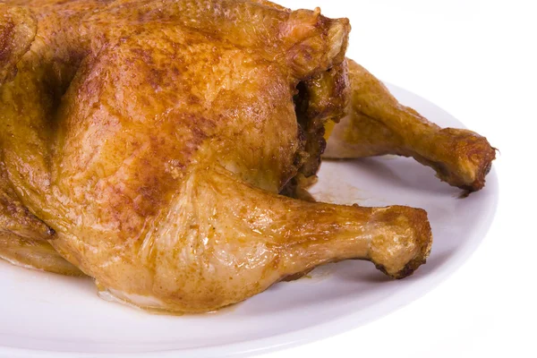 Gebratenes Huhn auf dem Teller Stockfoto