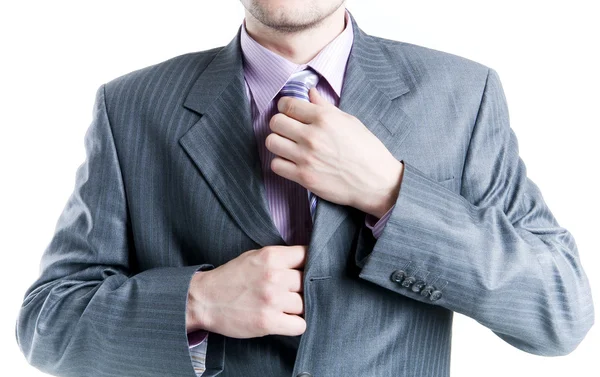 Gros plan d'un homme d'affaires attachant une cravate — Photo