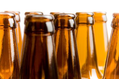 Close-up of beer bottles, focus on middl clipart