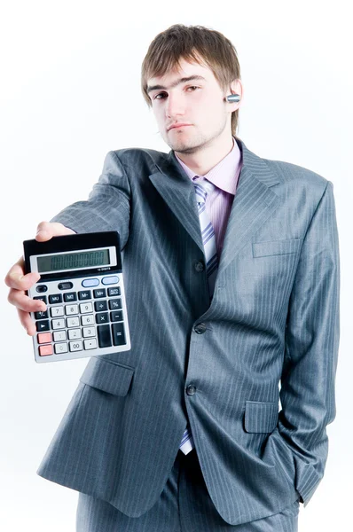 Tired businessman with calculator — Stock Photo, Image