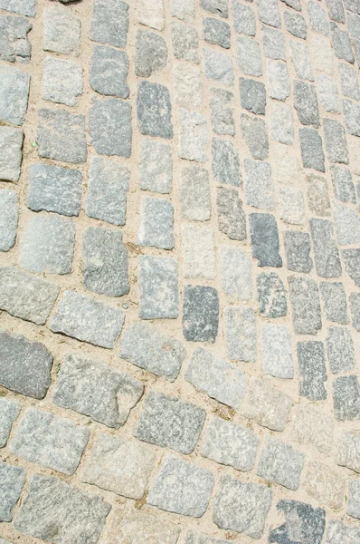 Stenen rijbaan textuur — Stockfoto