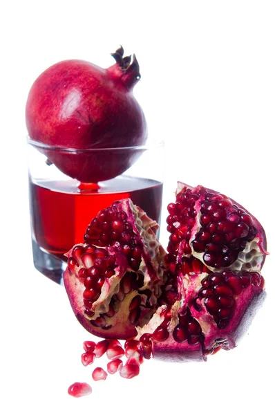 Pomegranate fruits and juice — Stock Photo, Image