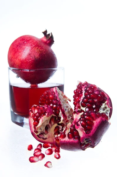 Frutas y jugos de granada —  Fotos de Stock