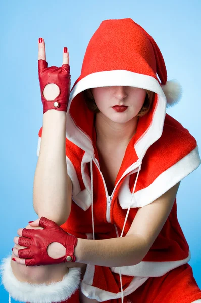 Hűvös lány a ruhákat, santa claus — Stock Fotó