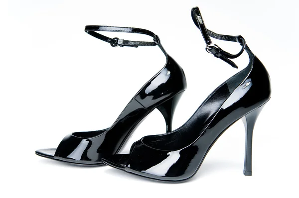 Pair of black glossy shoes — Stock Photo, Image