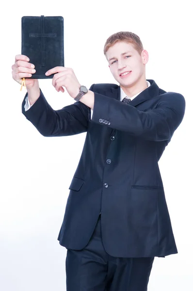 Young man showing Bible — Stock Photo, Image