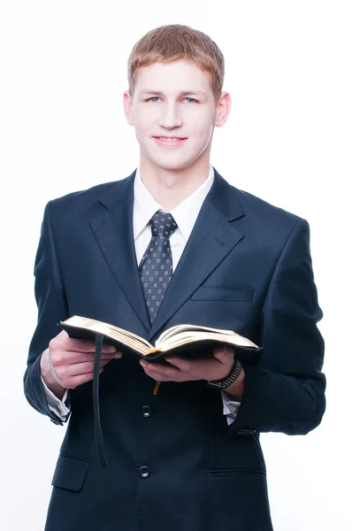 Junger Mann mit Bibel — Stockfoto