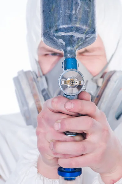 Close-up of worker with airbrush gun — Stock Photo, Image