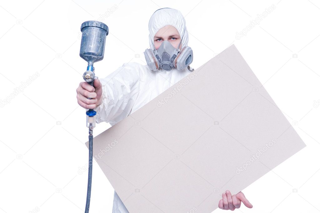 Man with airbrush gun and blank