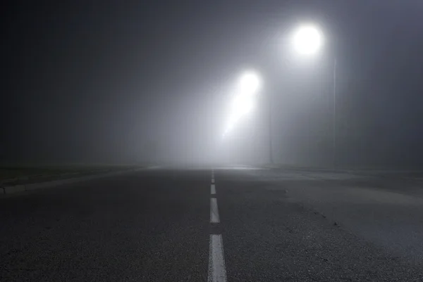 Road in fog — Stock Photo, Image