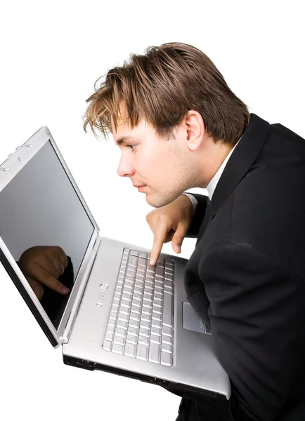 Ung affärsman med laptop — Stockfoto