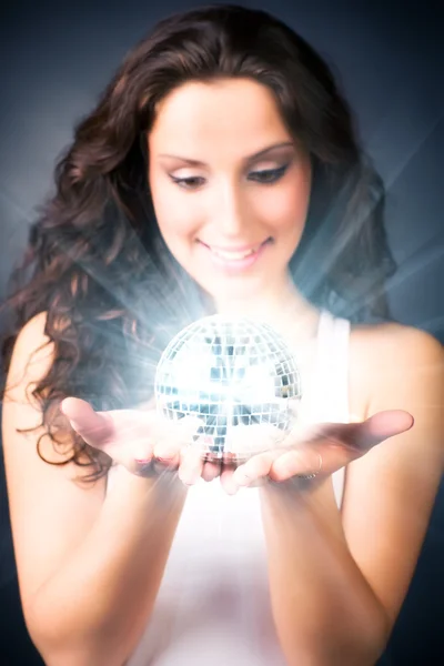 Young woman with magic shine ball — Stock Photo, Image
