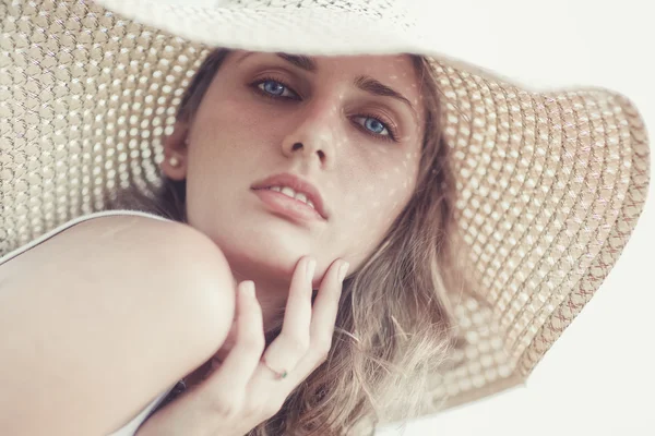 stock image Young woman in a hat portrait