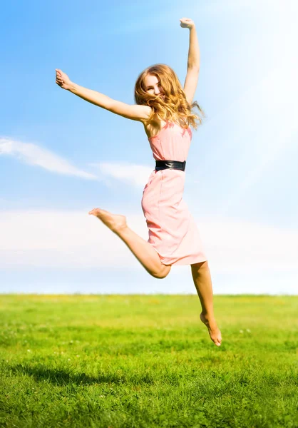 Happy jumping girl Royalty Free Stock Images