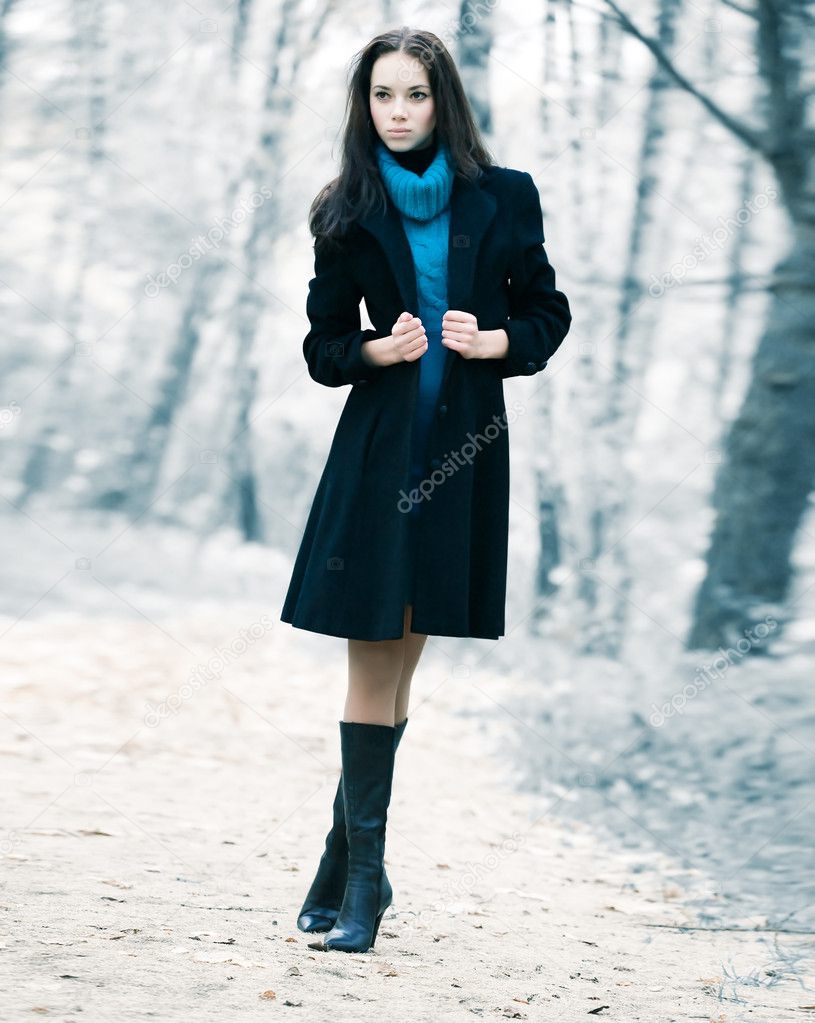Lonely woman in a forest