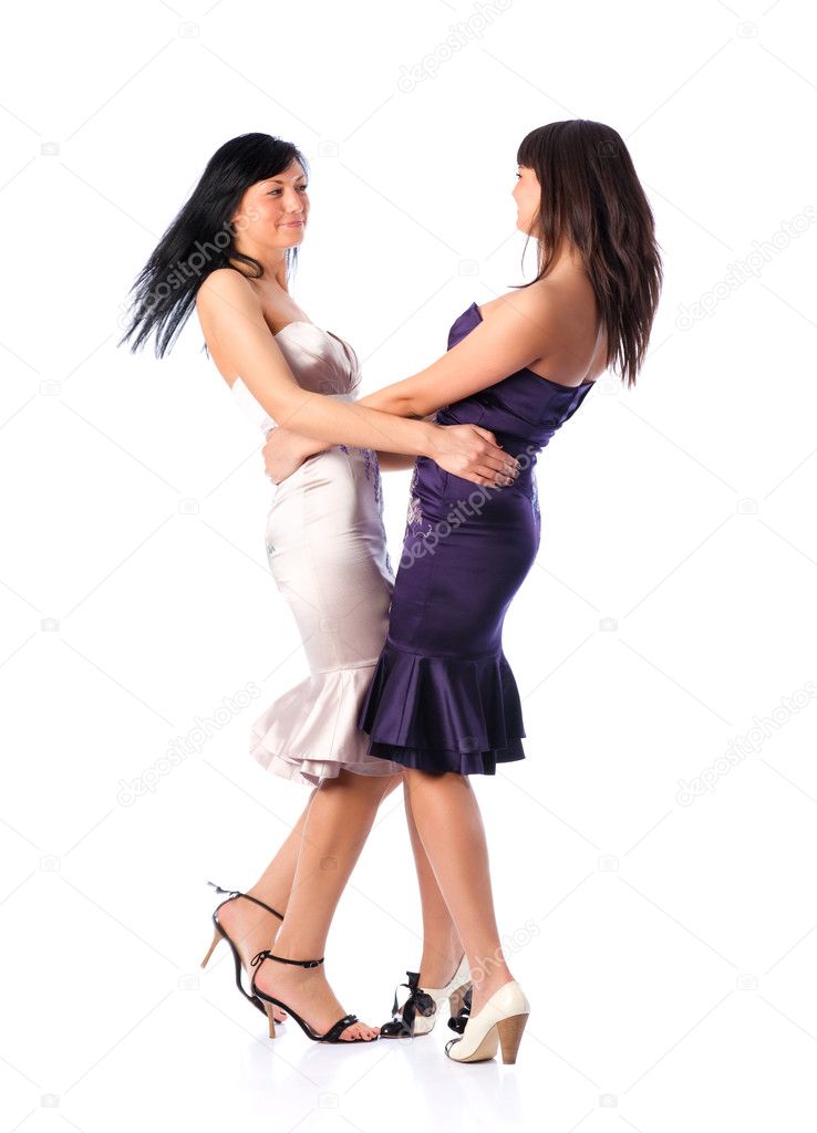 Two young women dancing