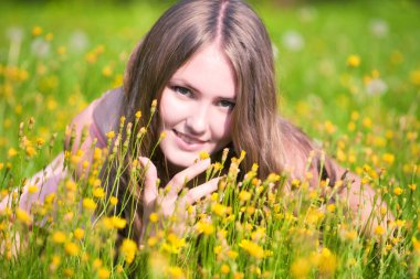 Young woman on a summer field clipart