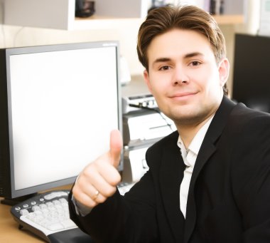 Happy businessman in office clipart