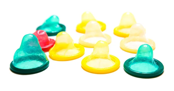 Многоцветные презервативы — стоковое фото