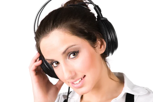 Junge Frau mit großen Kopfhörern — Stockfoto