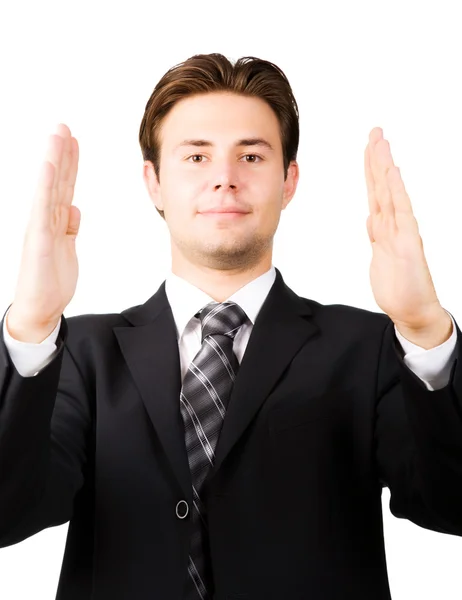 Young businessman showing big size — Stock Photo, Image