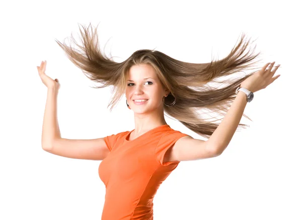 Mujer joven con el pelo aleteo — Foto de Stock