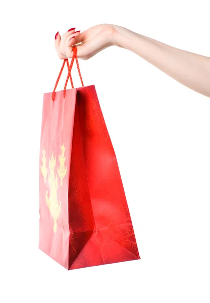 Nő leosztás holding bevásárló táska — Stock Fotó