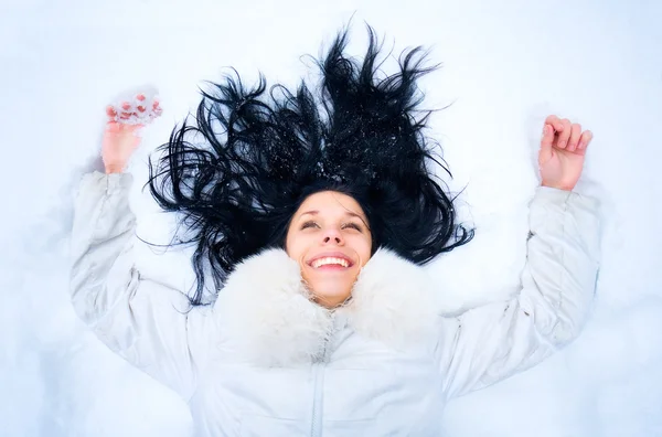 Жінка на снігу — стокове фото