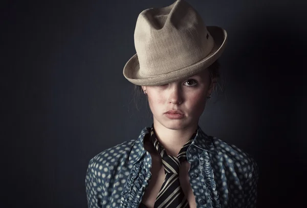 Woman in hat and tie portrait — Stock Photo, Image