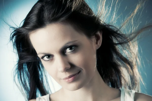 Woman with fluttering hair — Stock Photo, Image