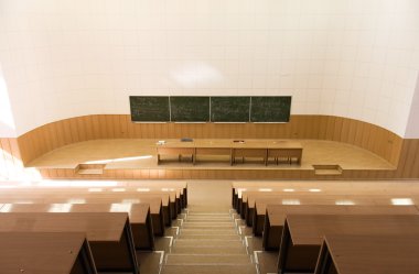 Big empty lecture hall. Upstairs view. clipart