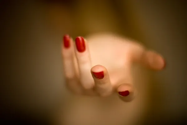 Kobieta pomocną dłoń — Zdjęcie stockowe