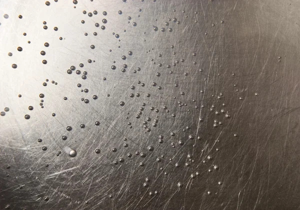 Металева поверхня з маленькими бульбашками — стокове фото