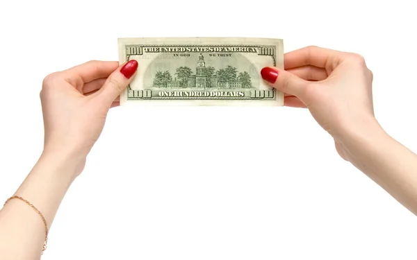 Руки женщины держат доллар — стоковое фото