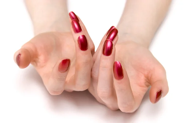 Žena ukazuje červené nehty — Stock fotografie