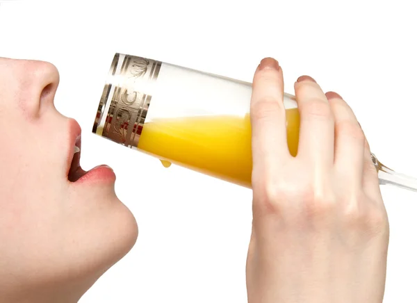 Drinking orange juice — Stock Photo, Image