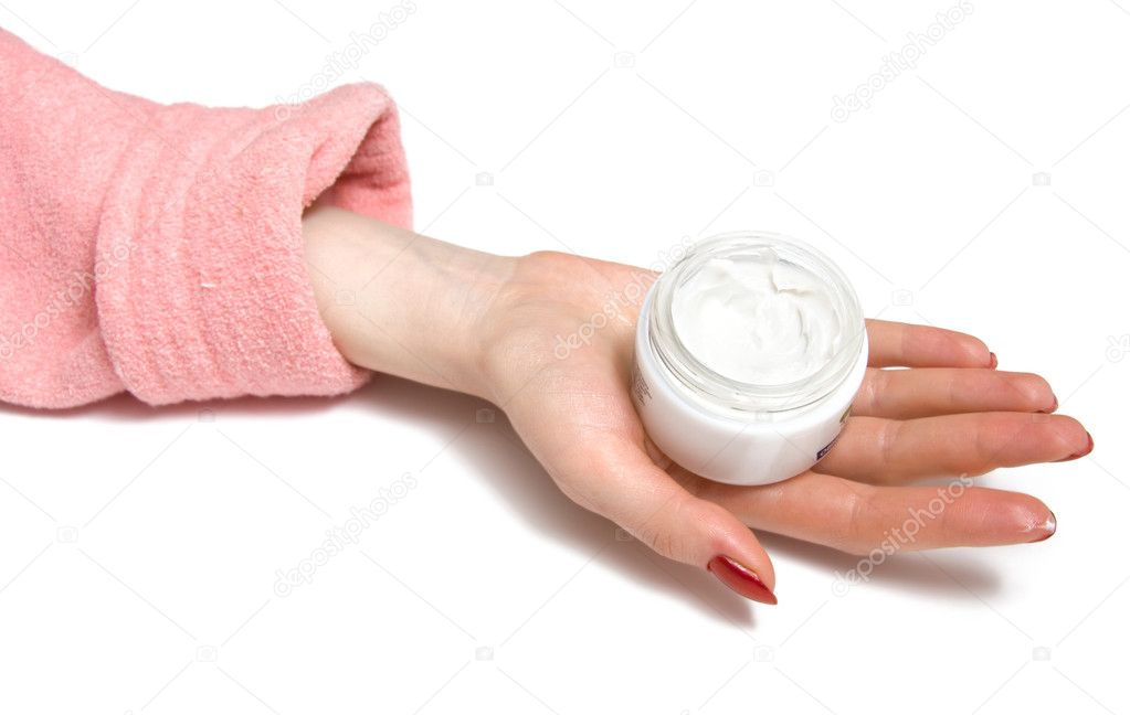 Woman hand with cream