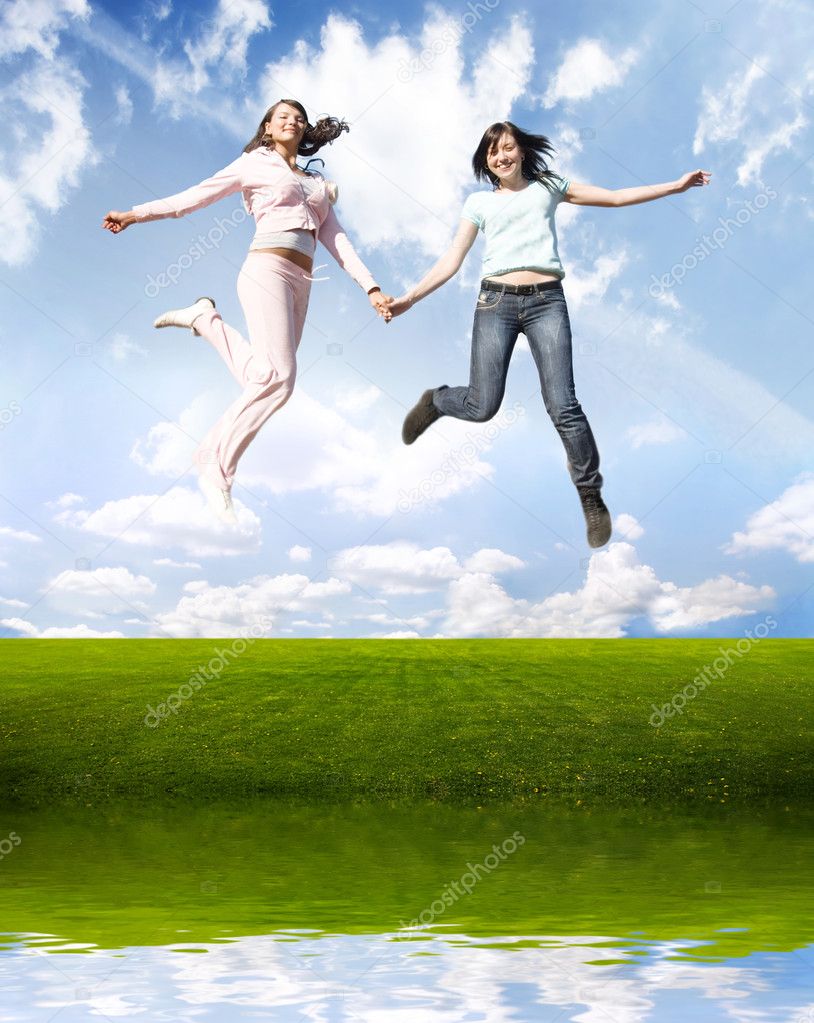 Happy jumping girls
