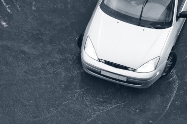 Modern car in the rain clipart