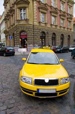 Yellow taxi wide angle view clipart