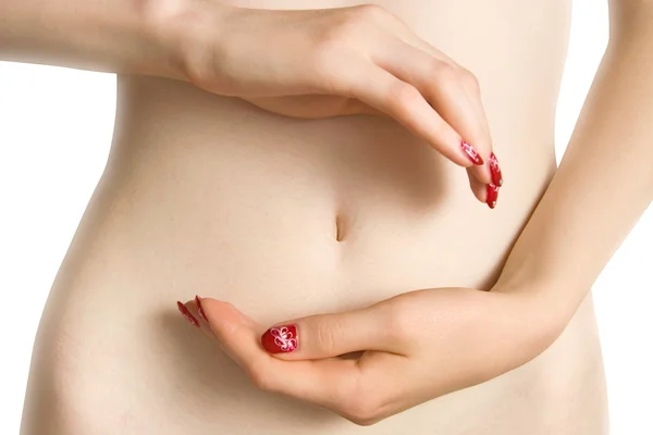 Mujer vientre con las manos — Foto de Stock