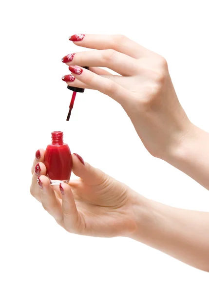 Mani donna con vernice rossa — Foto Stock
