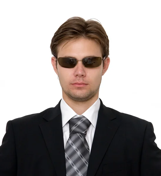 Homem de negócios severo em óculos de sol — Fotografia de Stock