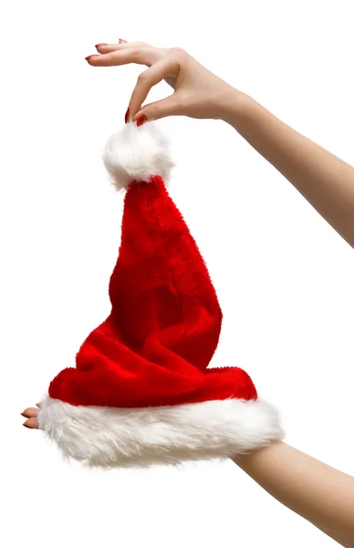 Donna mani tenendo cappello di Babbo Natale — Foto Stock