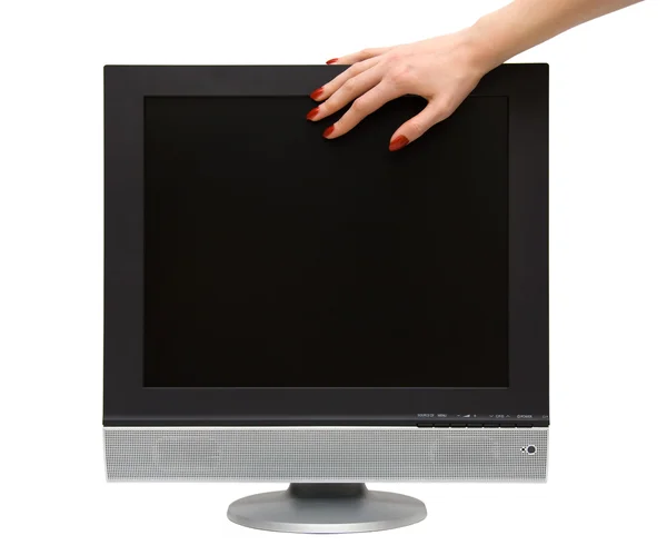 Mão mulher na tela lcd-tv — Fotografia de Stock