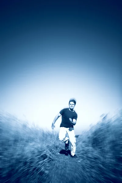 Fast running man blue tint — Stock Photo, Image
