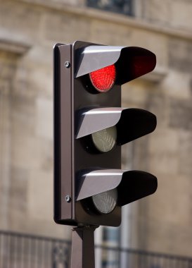 Traffic lights on urban background clipart