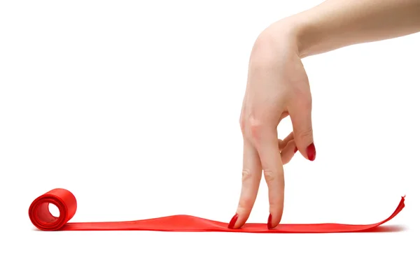 Walking fingers on a red ribbon — Stock Photo, Image