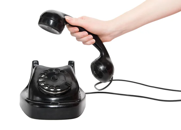 Retro telephone with woman hand — Φωτογραφία Αρχείου