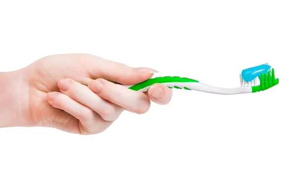 Woman hand with tooth brush — Stock Photo, Image